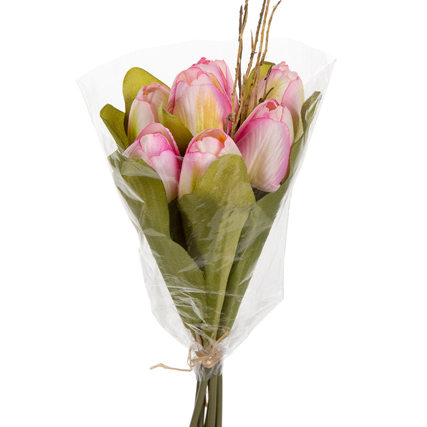 Bouquet de tulipes artificielles rose et vert, emballé dans un film plastique transparent