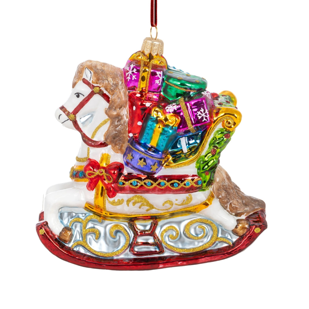 Cheval à bascule en verre soufflé blanc, chargé de cadeaux colorés et rehauts dorés