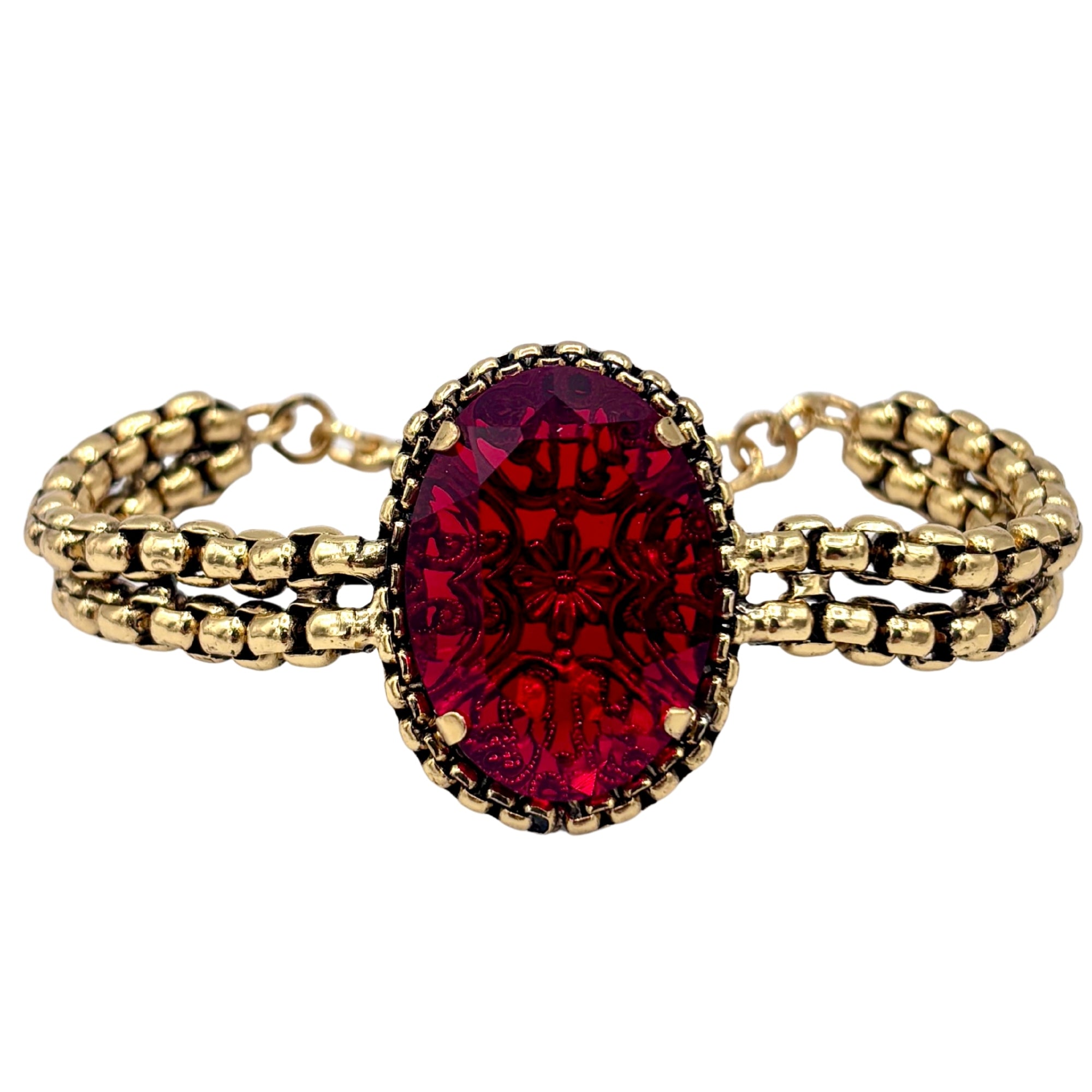 Bracelet en laiton doré à double chaîne avec grand cristal rouge ovale gravé en relief au centre