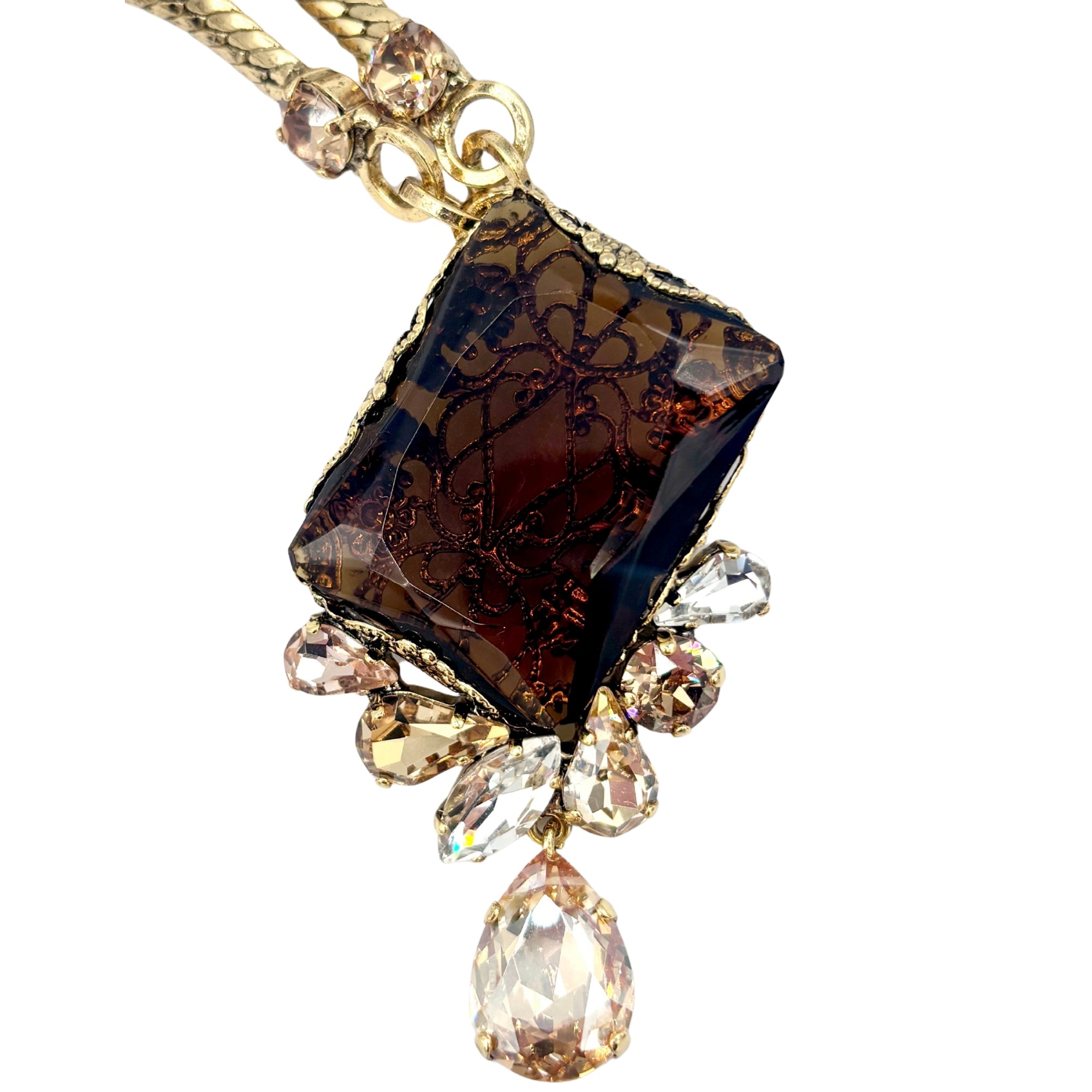 Collier en cristal ambré facetté avec pendentif géométrique, monture dorée et pampilles en cristaux clairs en goutte