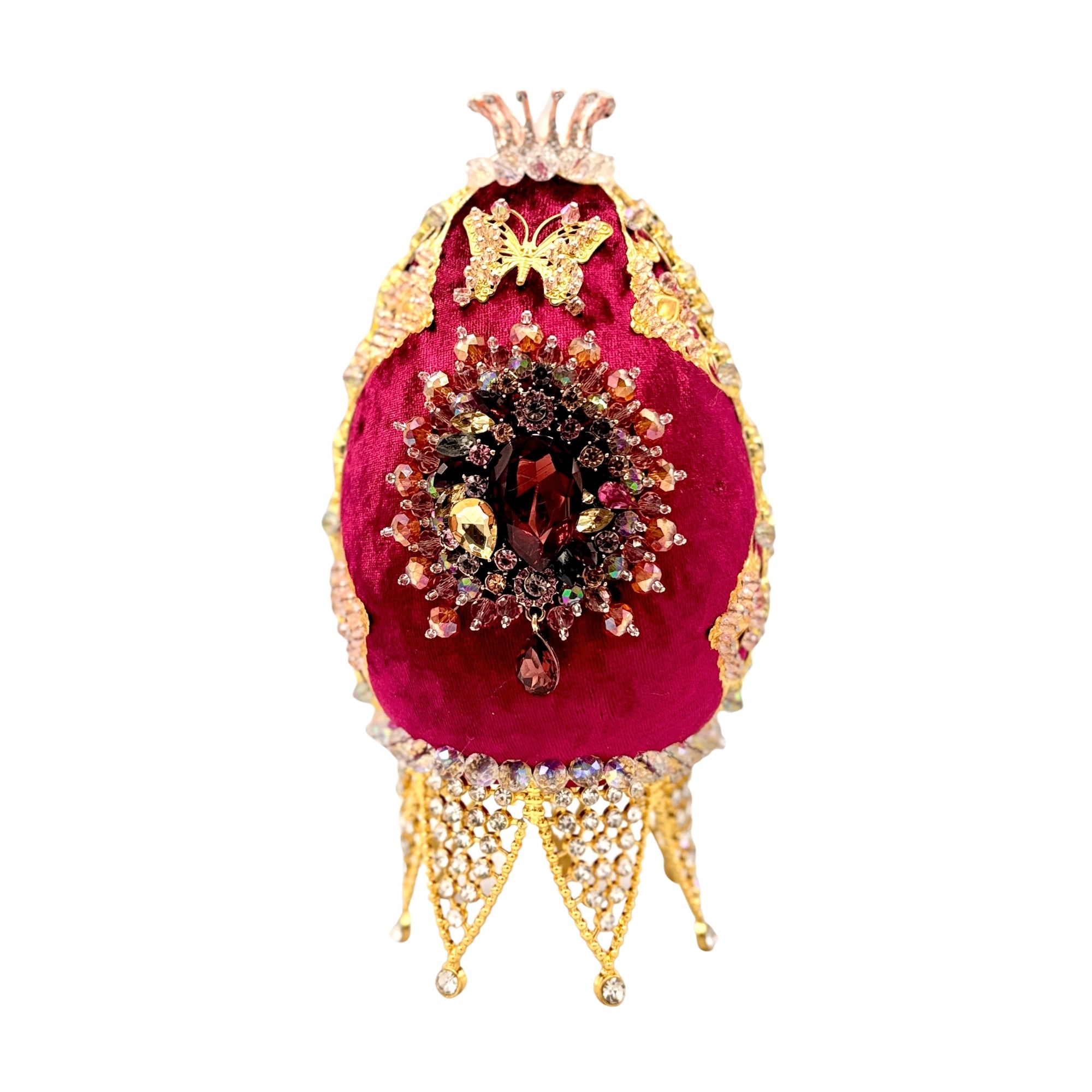 Œuf décoratif fuchsia en velours, orné de cristaux, papillon doré et piètement ajouré en métal doré