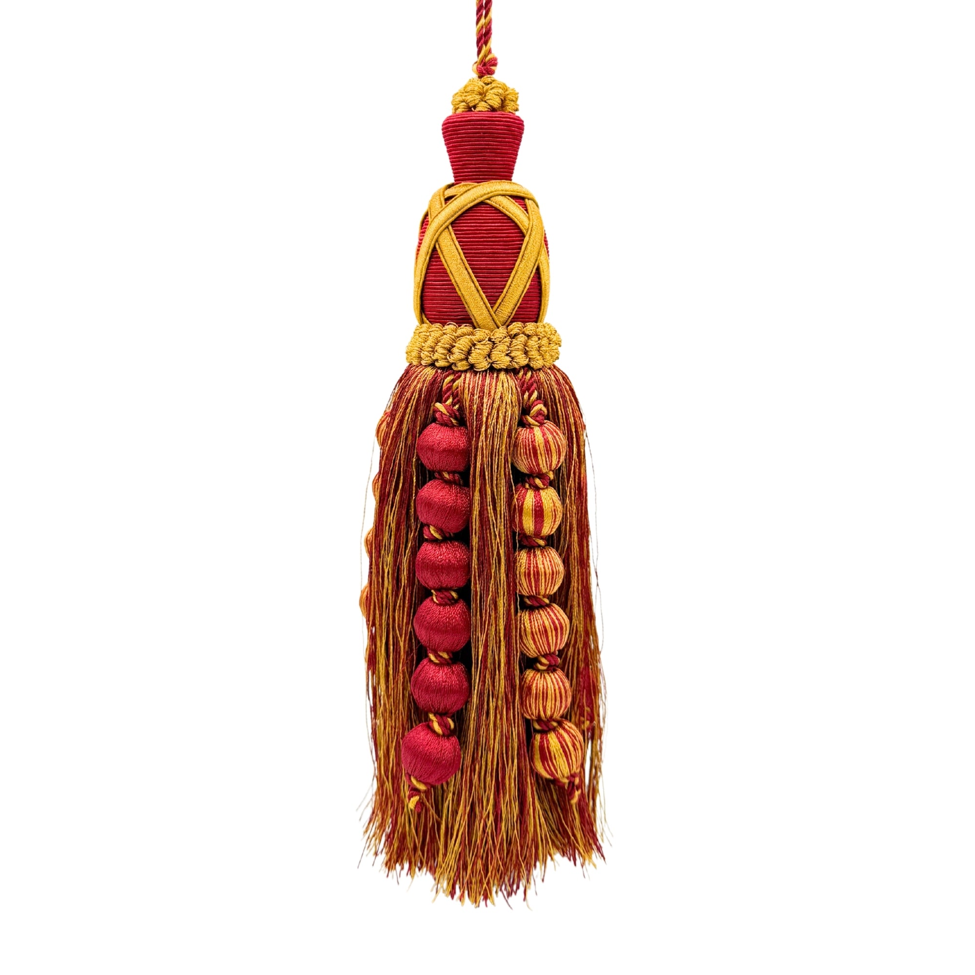 Pompon bordeaux et doré en fils torsadés, tête tressée et longue jupe à franges