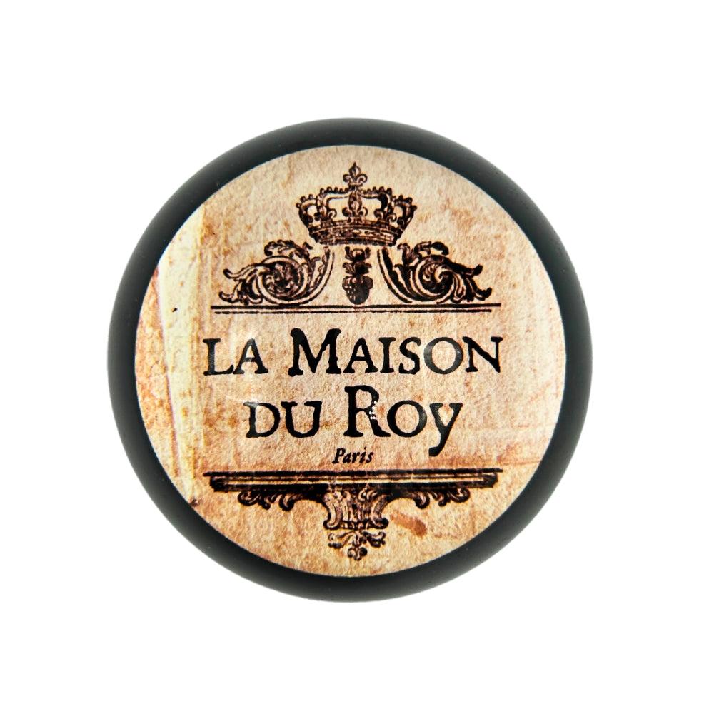 Presse-papier hémisphérique en verre noir avec logo La Maison du Roy Paris