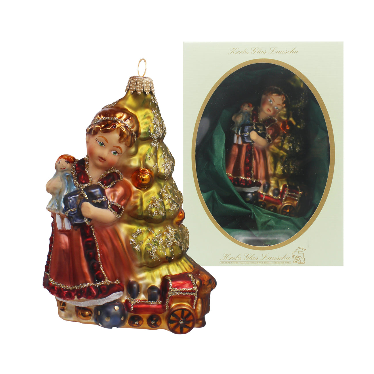 Jeune fille en verre soufflé rouge et or avec sapin décoré et petit cadeau
