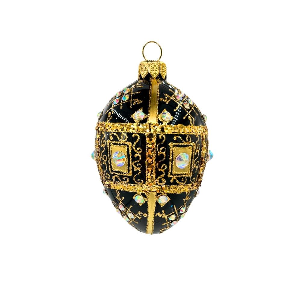 Œuf de Noël en verre soufflé noir orné de motifs dorés et de cristaux irisés