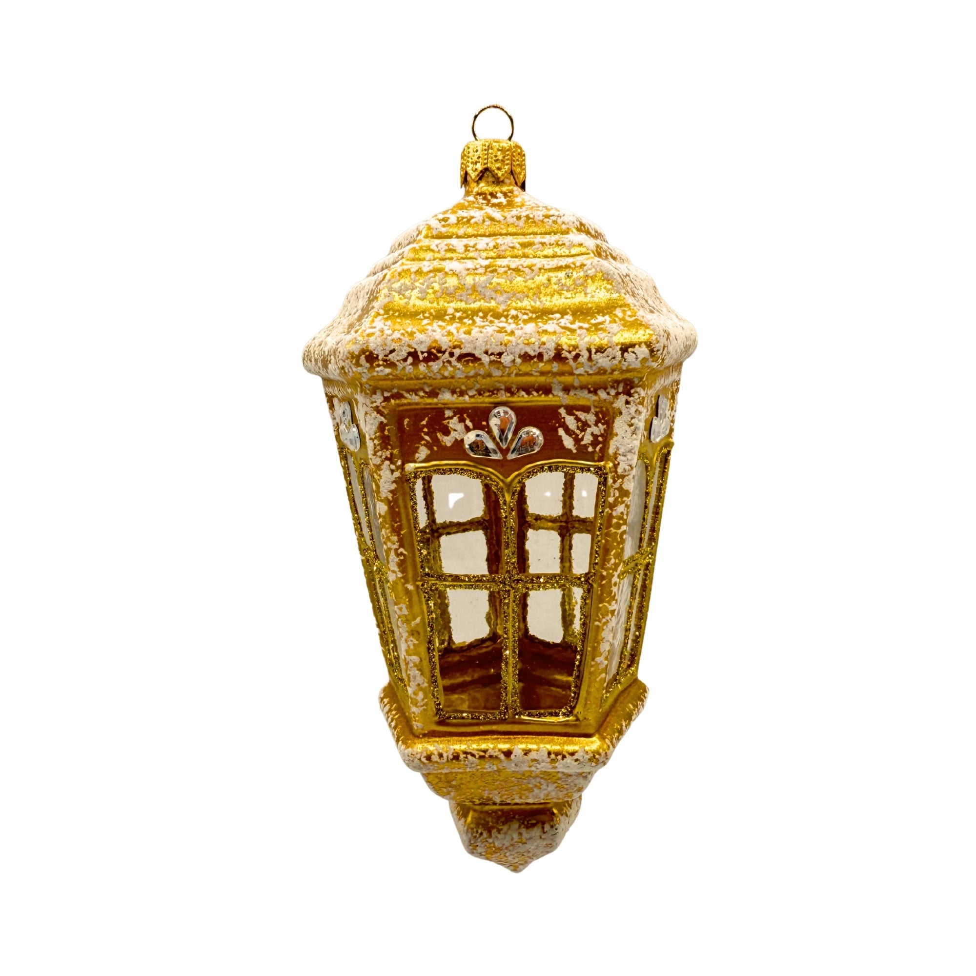Lanterne dorée en verre soufflé avec parois transparentes, structure ajourée et attache métallique supérieure