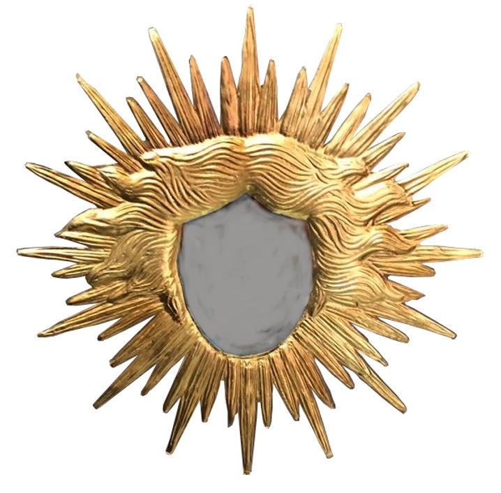 Miroir de sol doré en forme de soleil, cadre sculpté à rayons et centre miroir arrondi