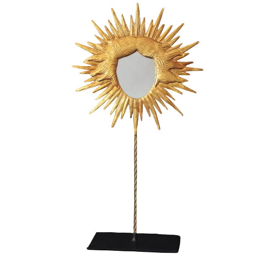 Miroir sur pied doré en forme de soleil, cadre rayonnant sculpté et base rectangulaire noire