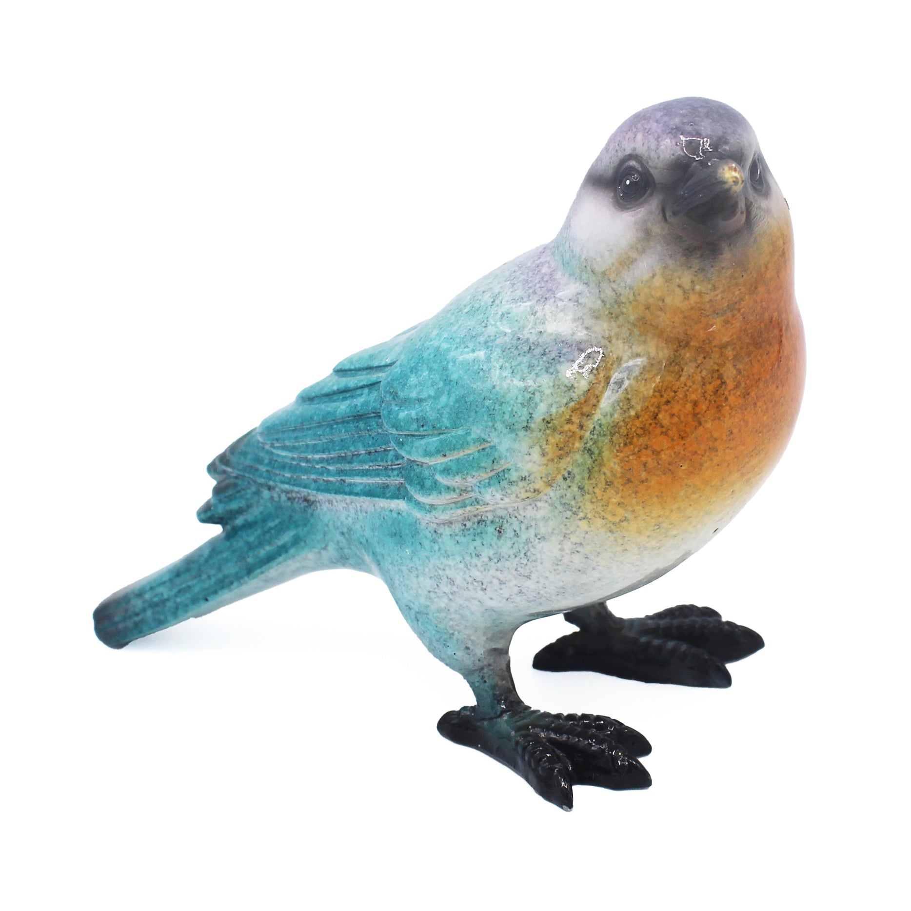 Oiseau décoratif en résine bleu, violet et orange, posé de trois quarts