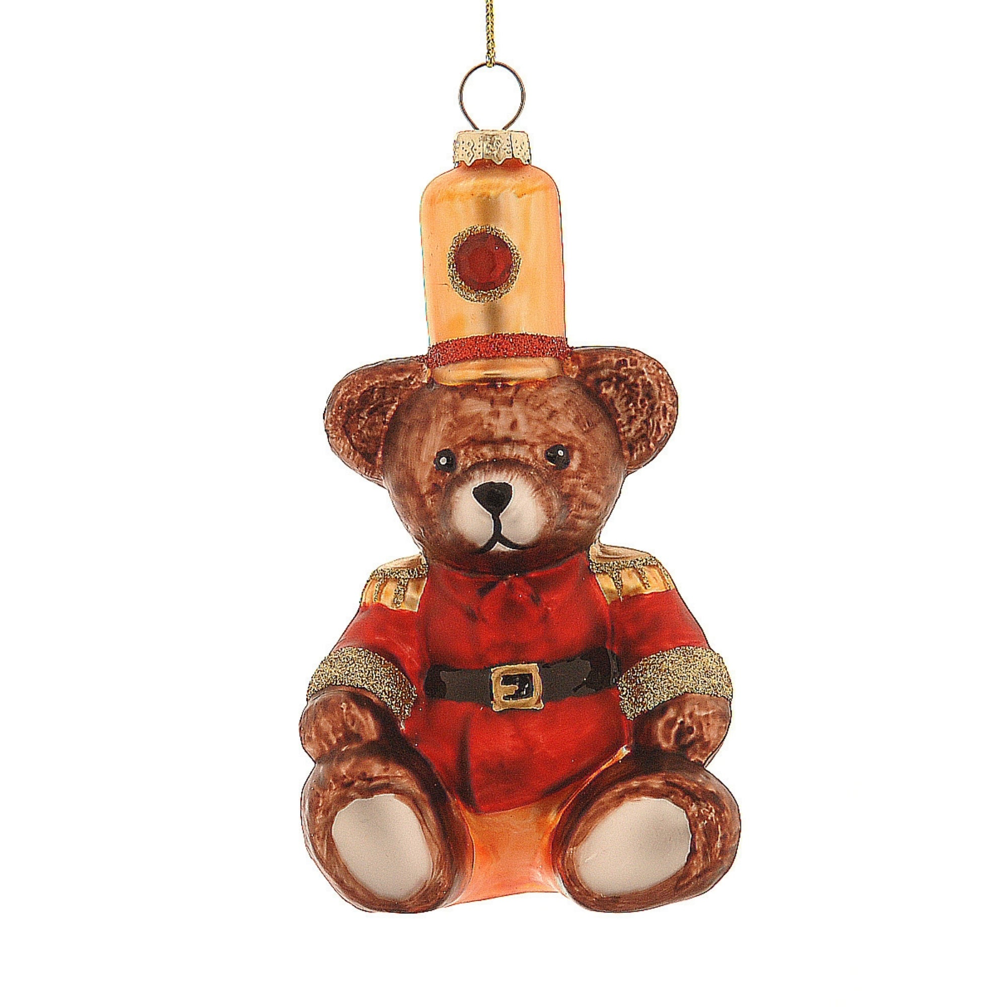 Ourson décoratif en verre déguisé en Casse-Noisette, figurine assise avec veste rouge, chapeau haut et finitions dorées