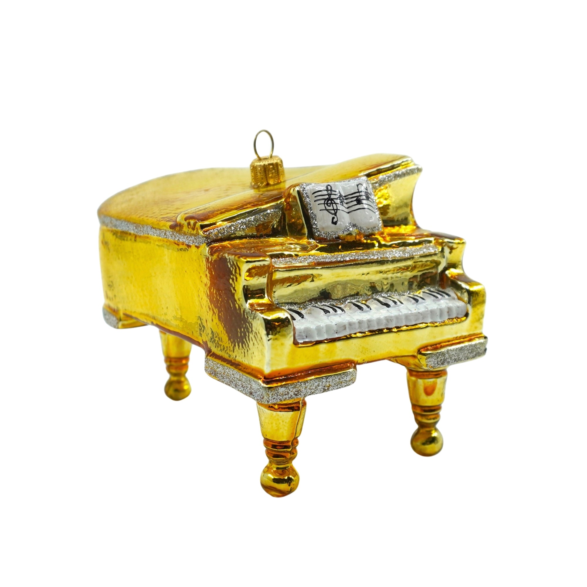 Piano en verre soufflé doré avec clavier blanc et noir, partition et paillettes argentées
