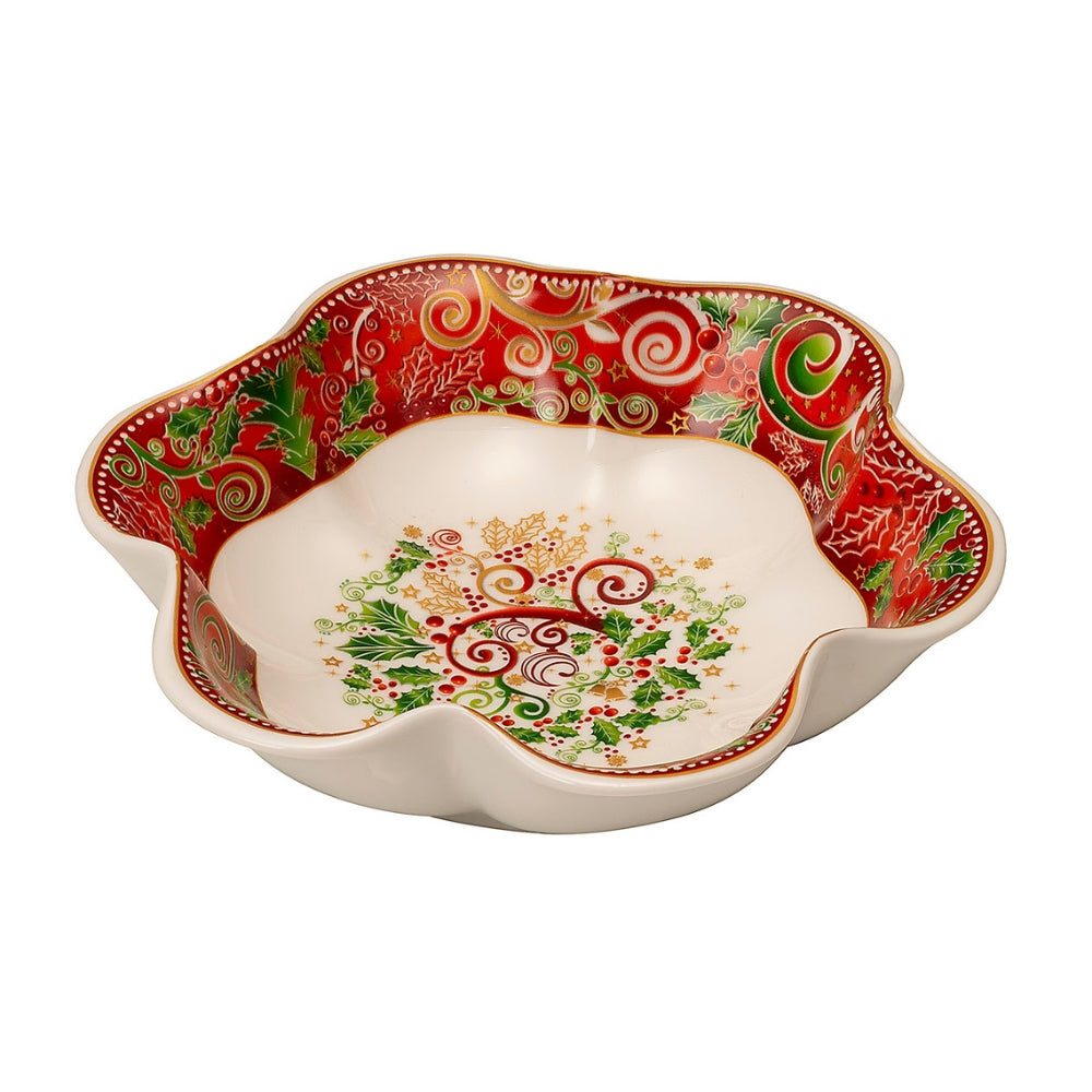 Plat de Noël en céramique blanche à bords ondulés, décor rouge et vert à houx et volutes dorées