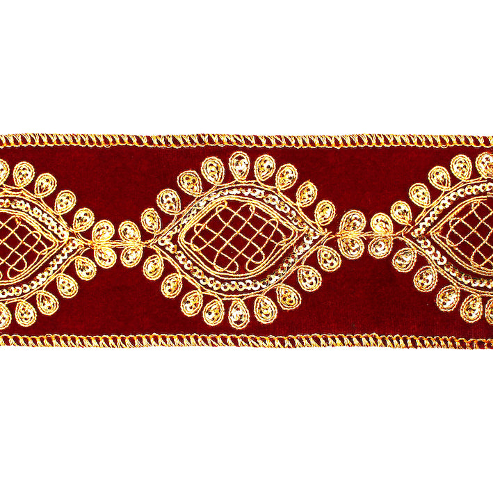 Ruban en velours bordeaux brodé de motifs dorés en losanges et ovales