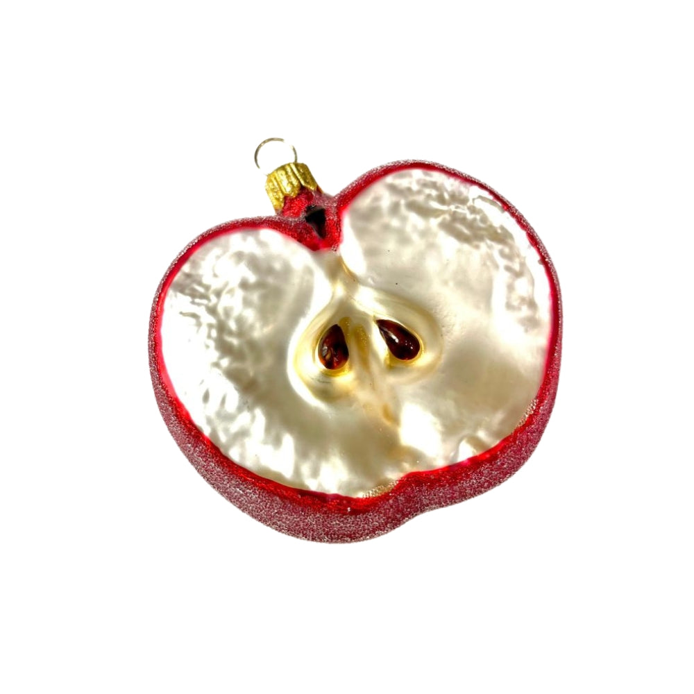 Tranche de pomme en verre soufflé rouge et blanc, moitiée suspendue avec pépins visibles