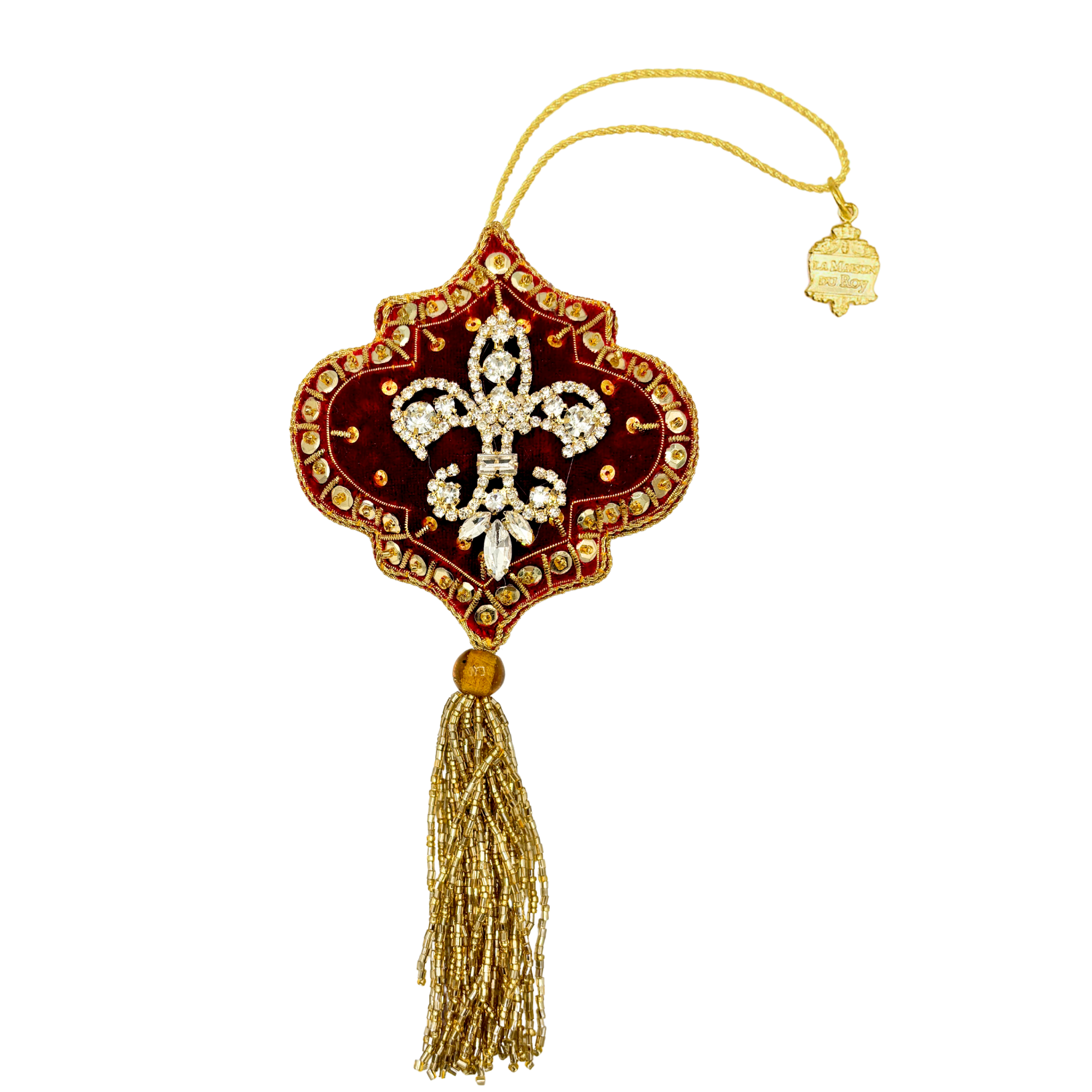 Ornement brodé rouge en fleur de lys, strass brillants, bordure et longue frange dorées