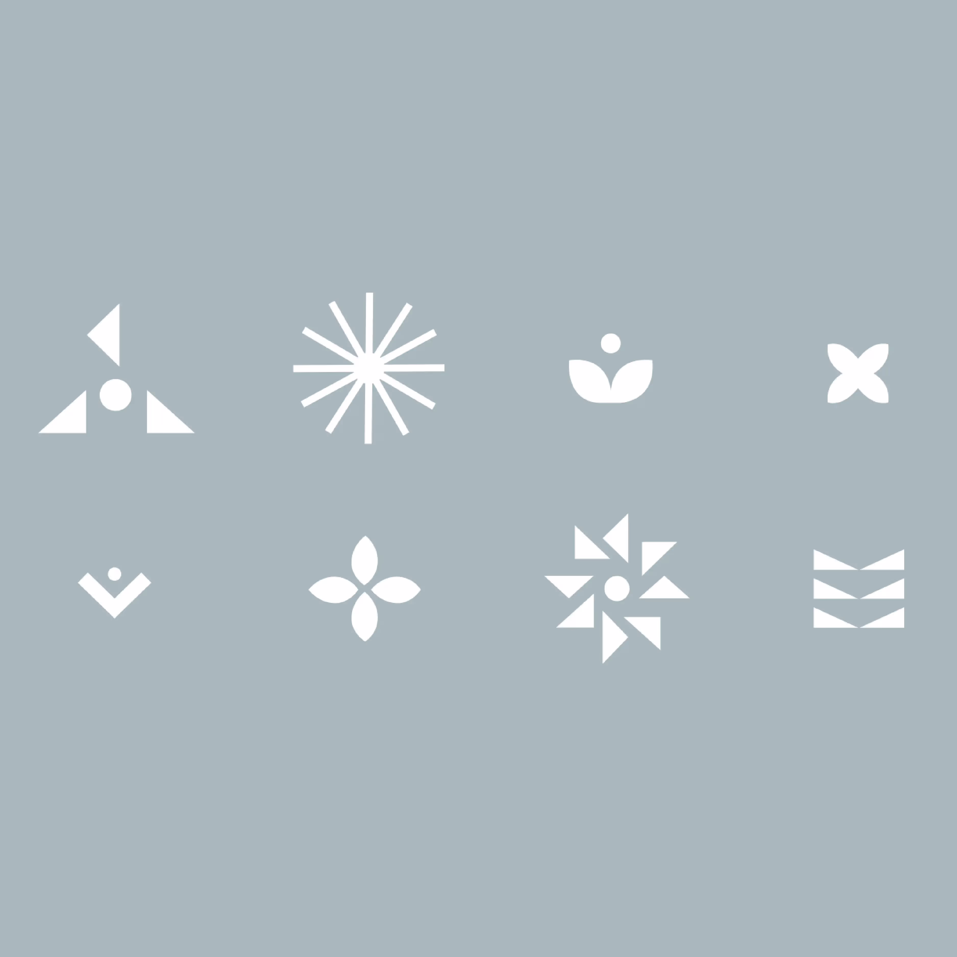White geometric icons and symbols on a soft gray background
