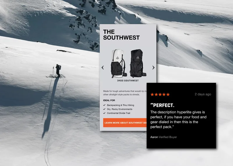 A snowboarder is going down a snowy mountain