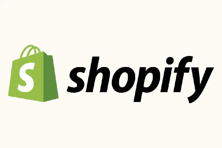 Shopify logo with green shopping bag and black italic text