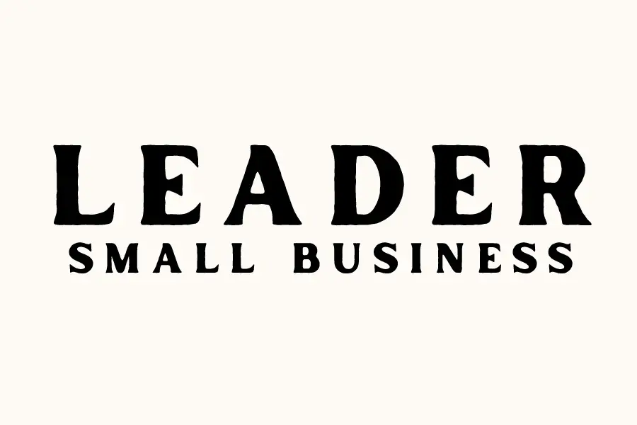 Black text reading "LEADER SMALL BUSINESS" on cream background