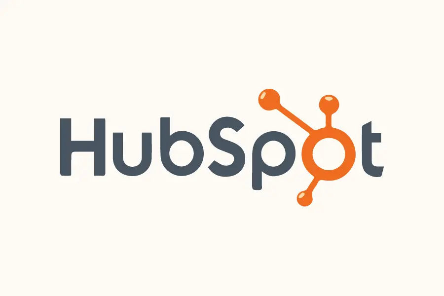 HubSpot logo featuring dark text with orange connected network icon symbol