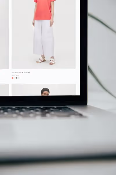 A laptop with a picture of a child on the screen