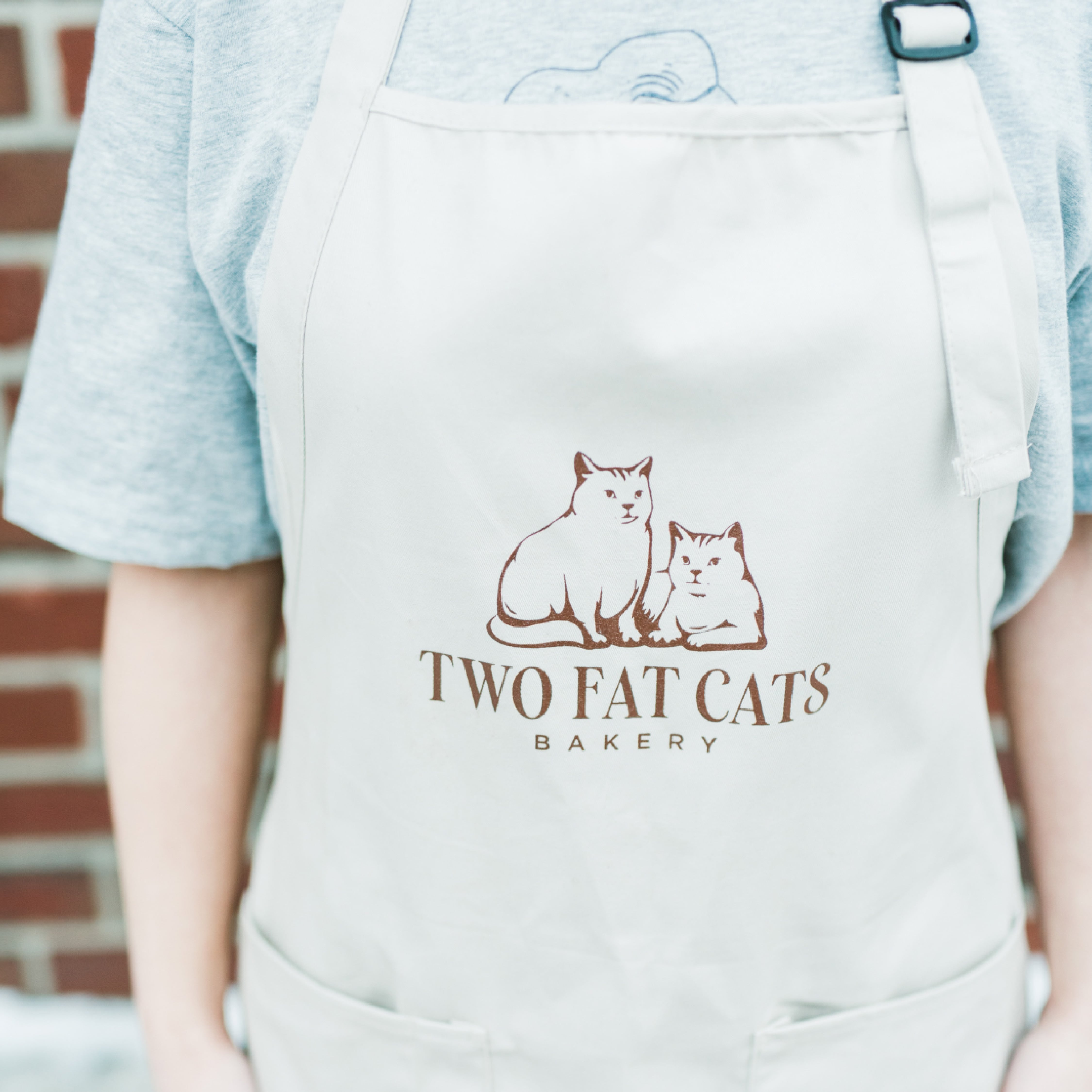 Two Fat Cats Bakery pie bookmark and to-go packaging stickers on kraft stock