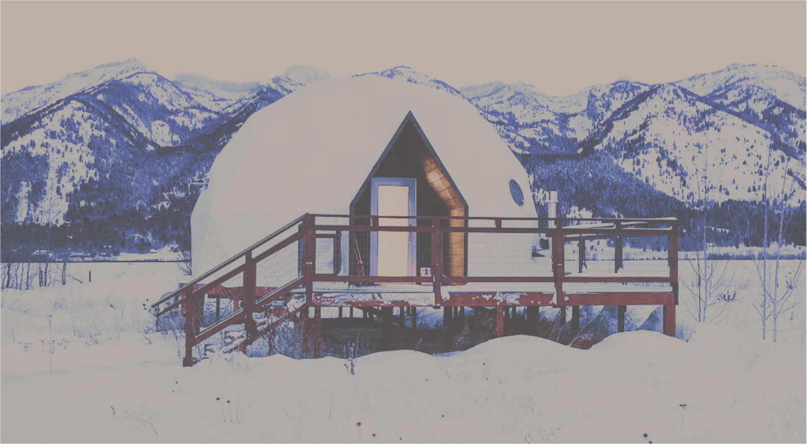 Geodesic domes in front of Tetons with sky cut out