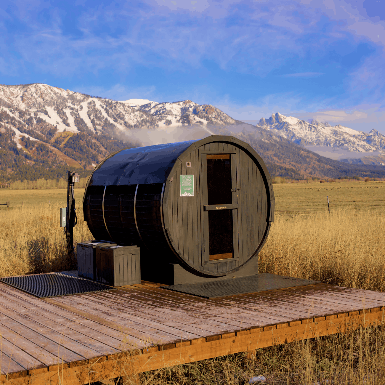 Geodesic domes in front of Grand Teton Mountains in the winter.