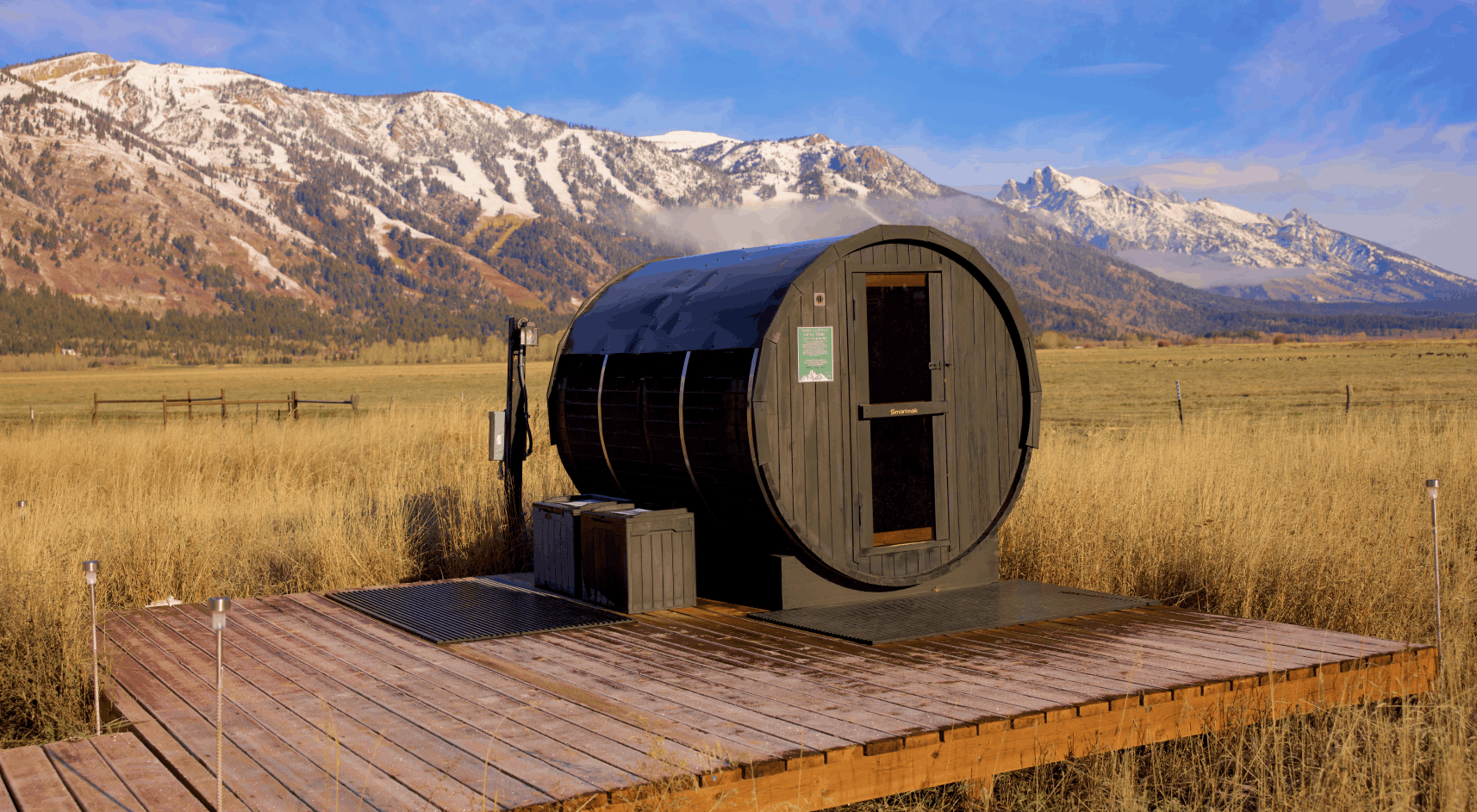 Geodesic domes in front of Grand Teton Mountains in the winter.