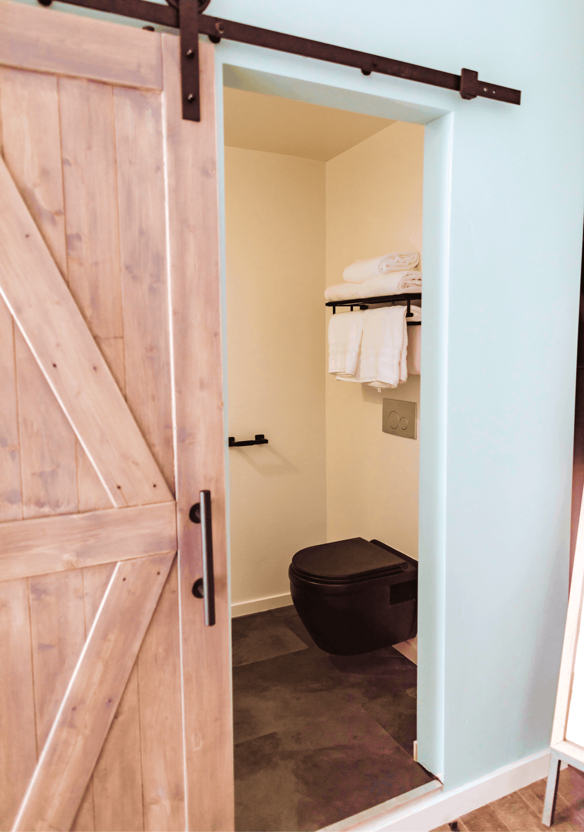 Toliet in bathroom of geodesic dome