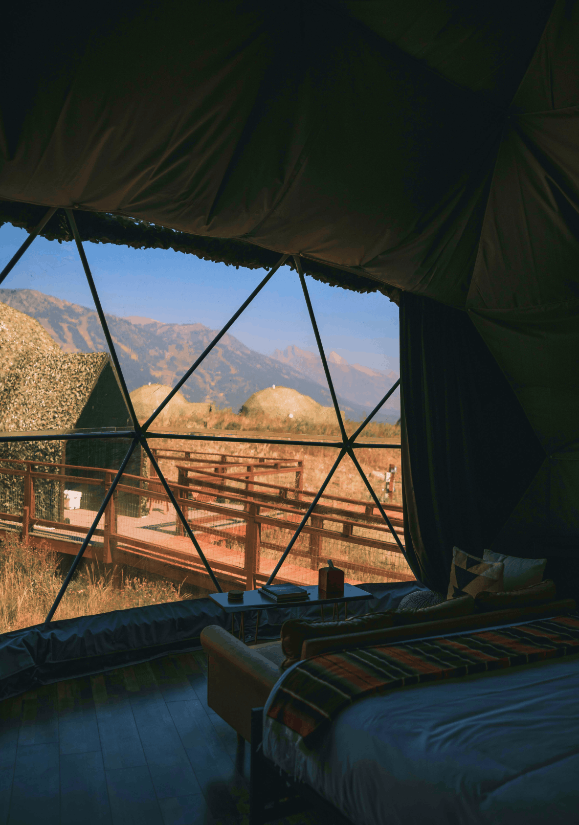 Sink and mirror in bathroom of geodesic dome