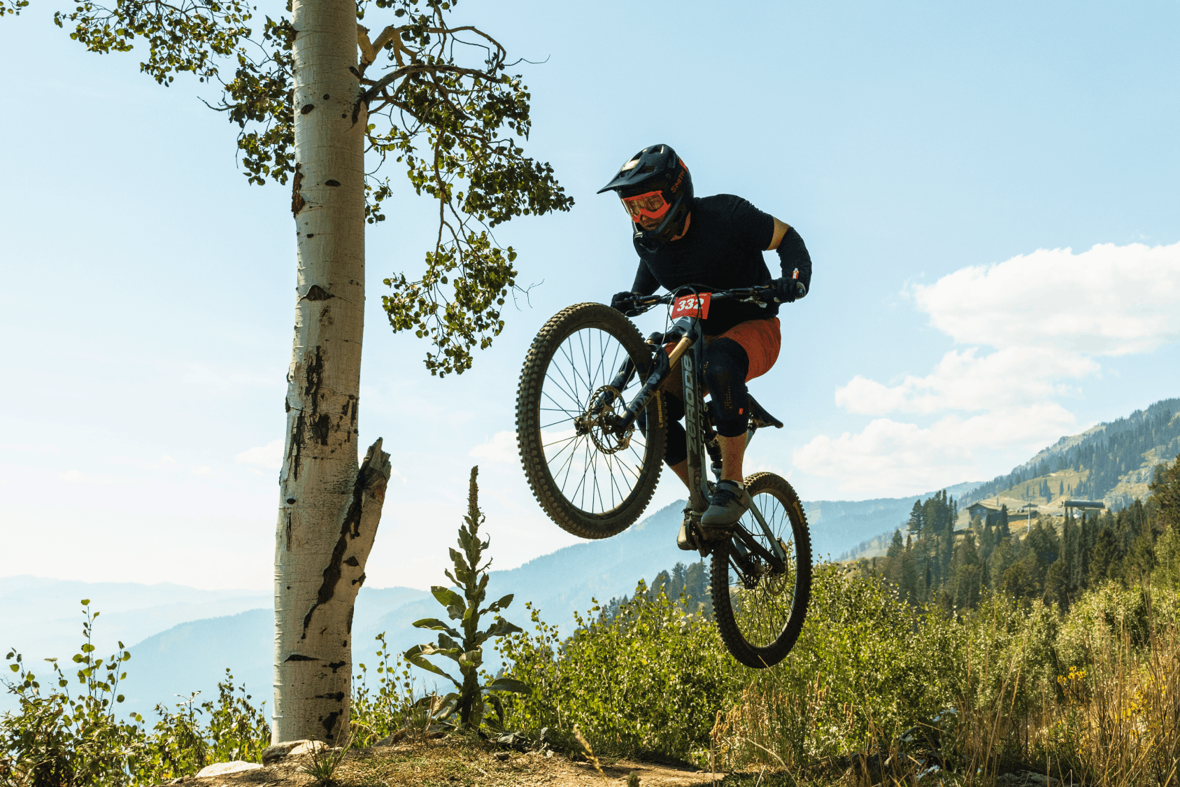 Mountain biking on a trail in the summer time