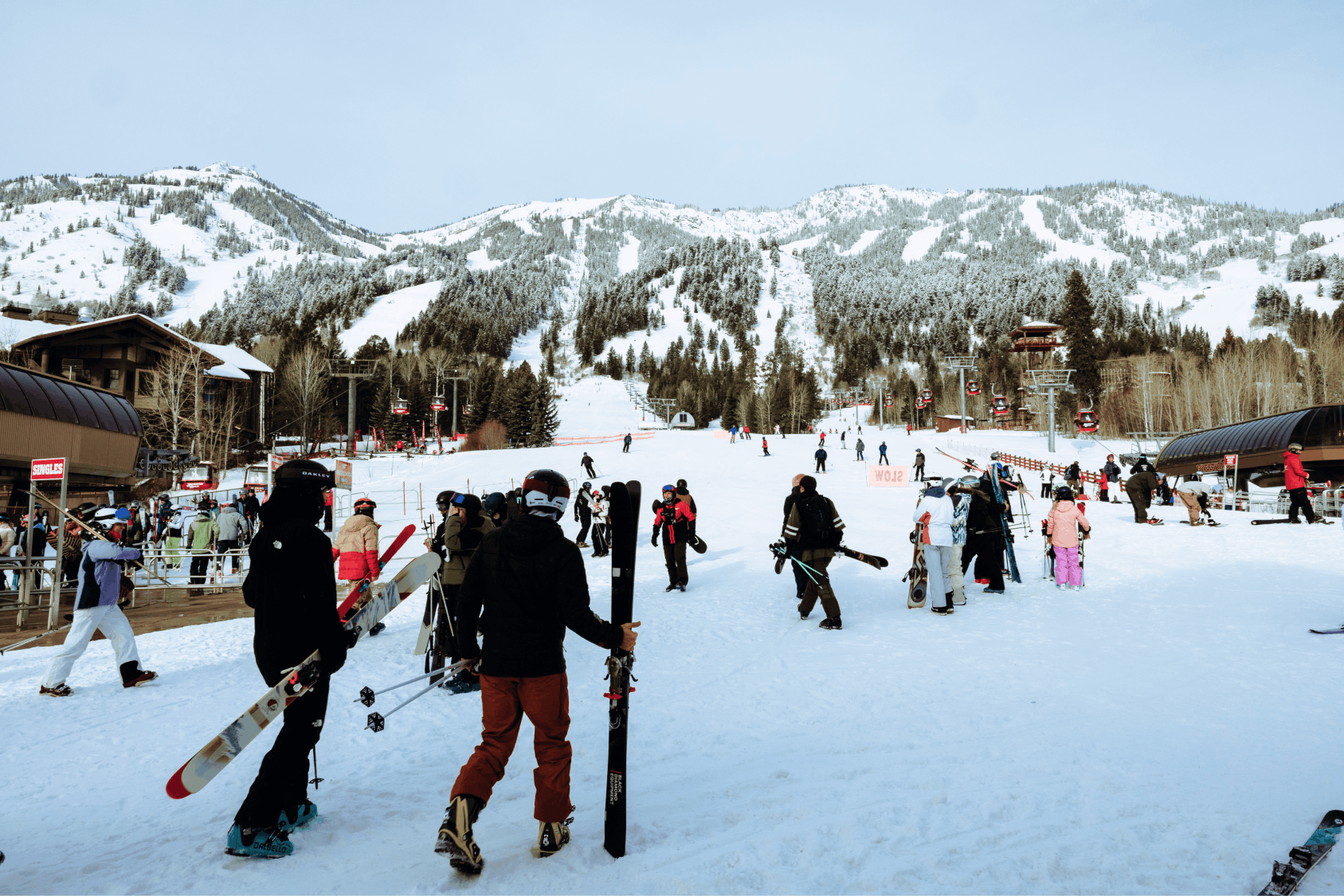 Geodesic dome in front of stream and Teton Mountains with pins pointing out JHMR, Grand Teton National Park, and Yellow Stone National Park.