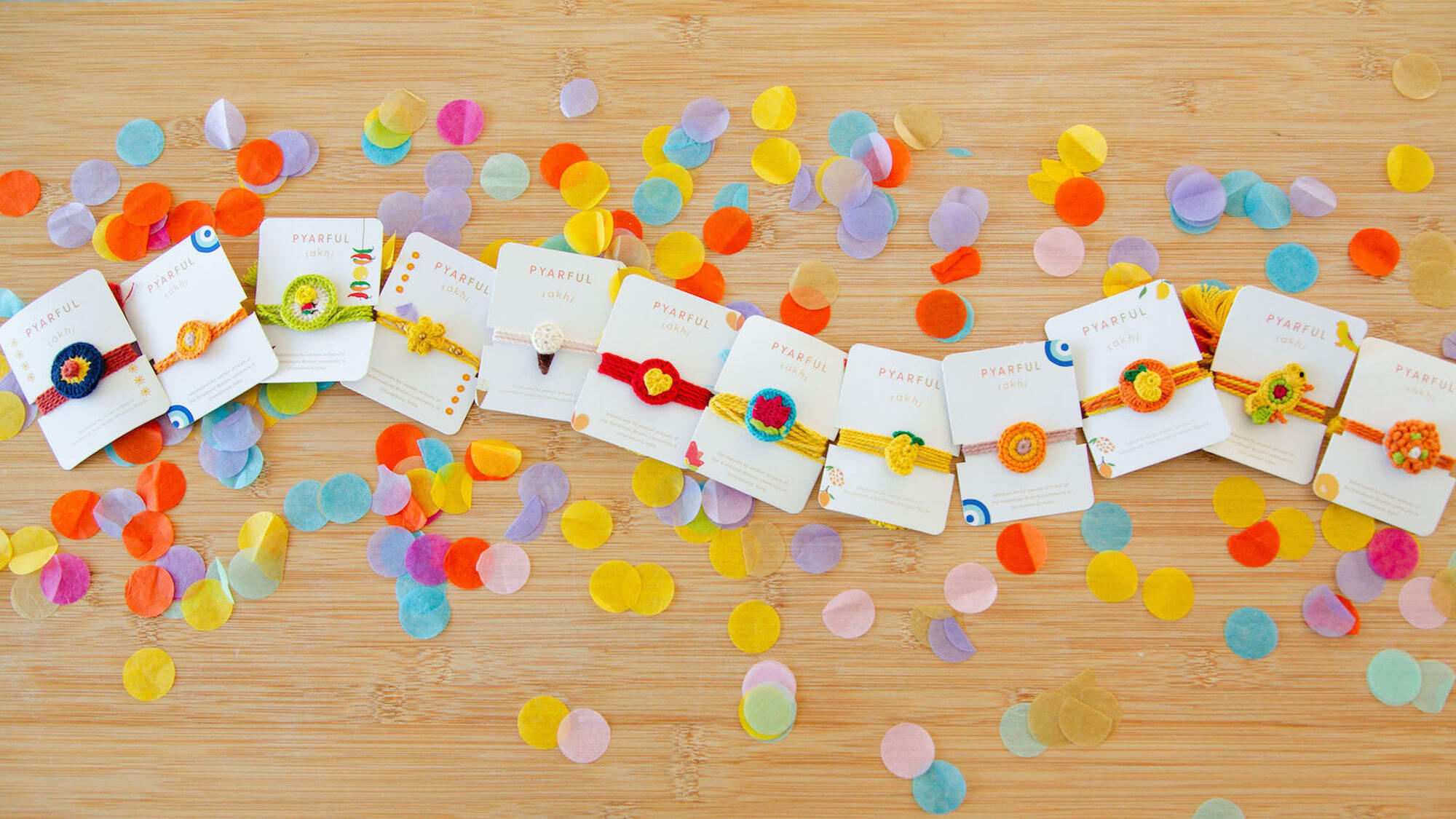 Cute handmade plastic-free rakhis made of yarn.