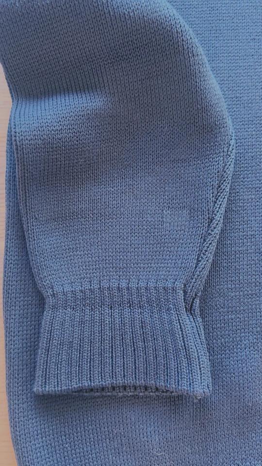 The same sleeve after repair in matching yarn