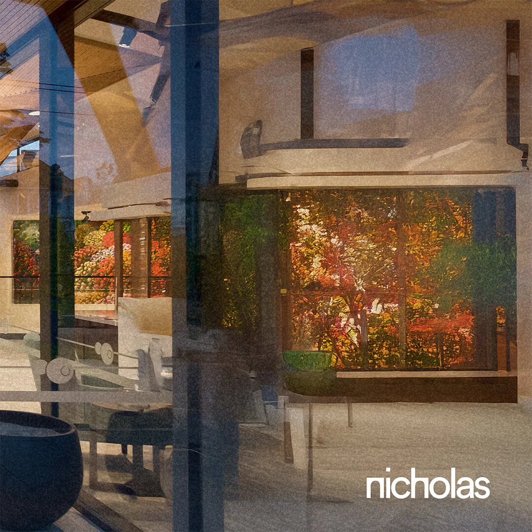 Light-filled Healthcare Space with large glass windows overlooking natural landscapes, designed for community well-being