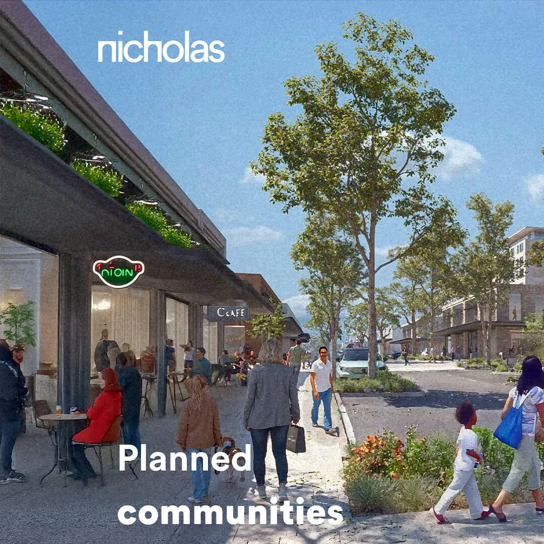 Vibrant pedestrian street with cafés, cyclists and people socialising, illustrating people-centred urban design