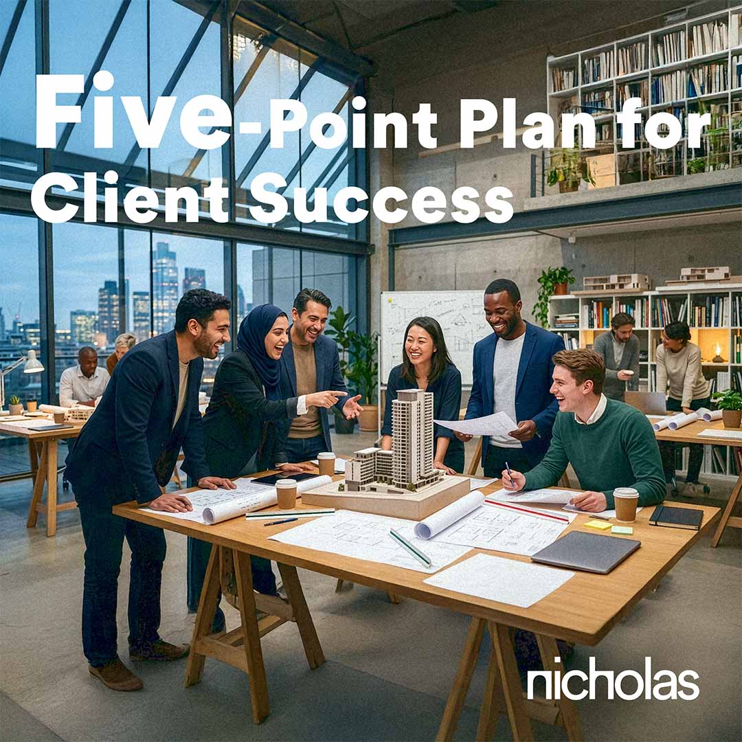 A group of young architects smiling around a studio table with architectural plans and a scale model, illustrating collaborative design work and a team-focused approach to project development