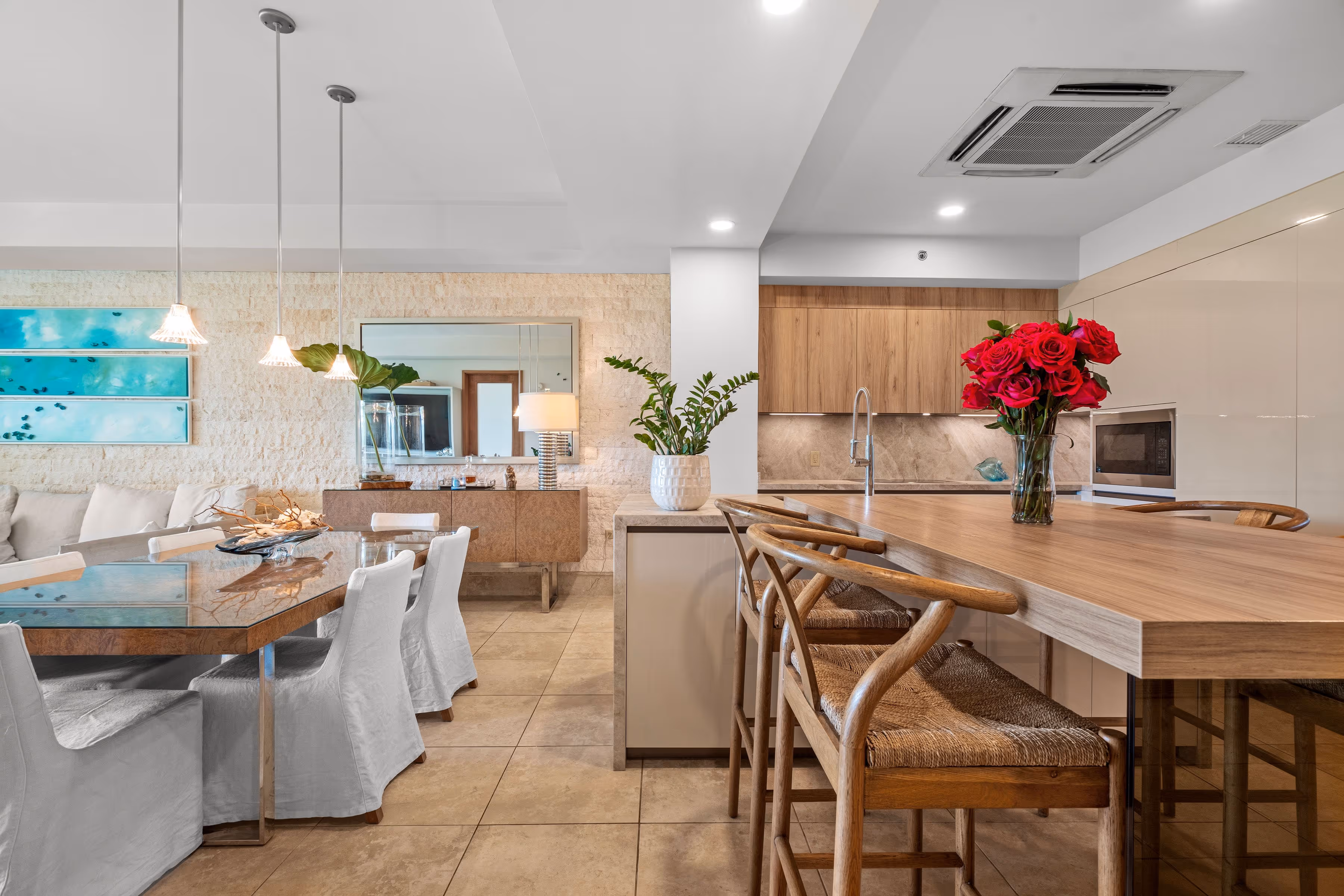 Luxurious kitchen island with designer chairs and contemporary decor at Plantation Village, Dorado Beach Resort