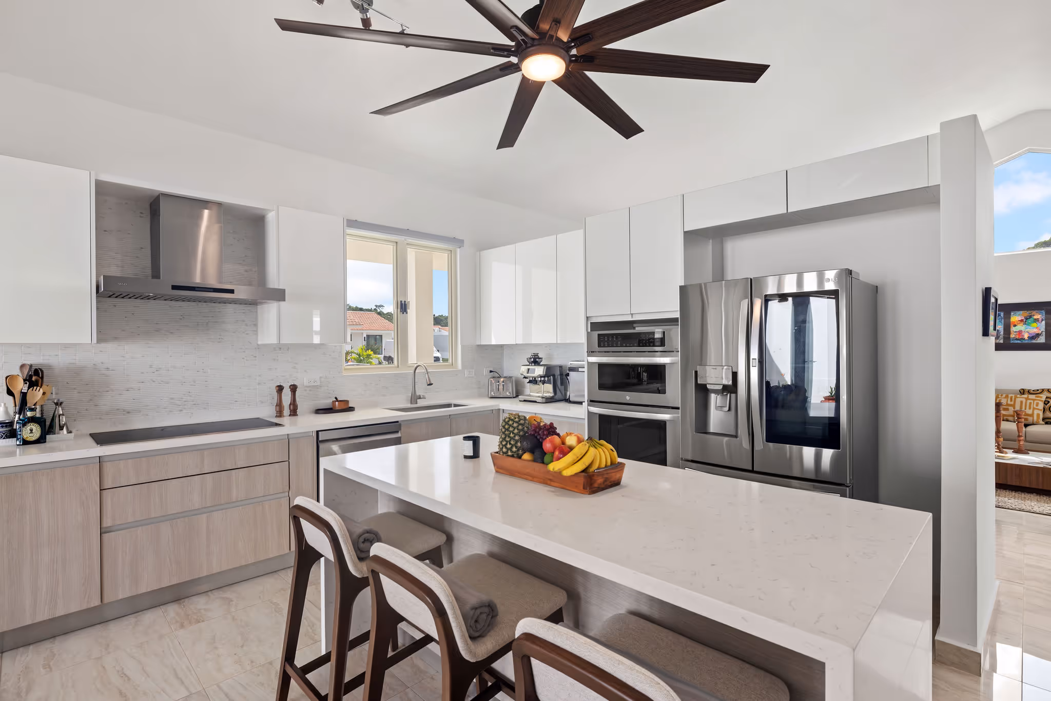 Chef-inspired kitchen with stainless steel appliances and marble countertops in eco-luxury Dorado property