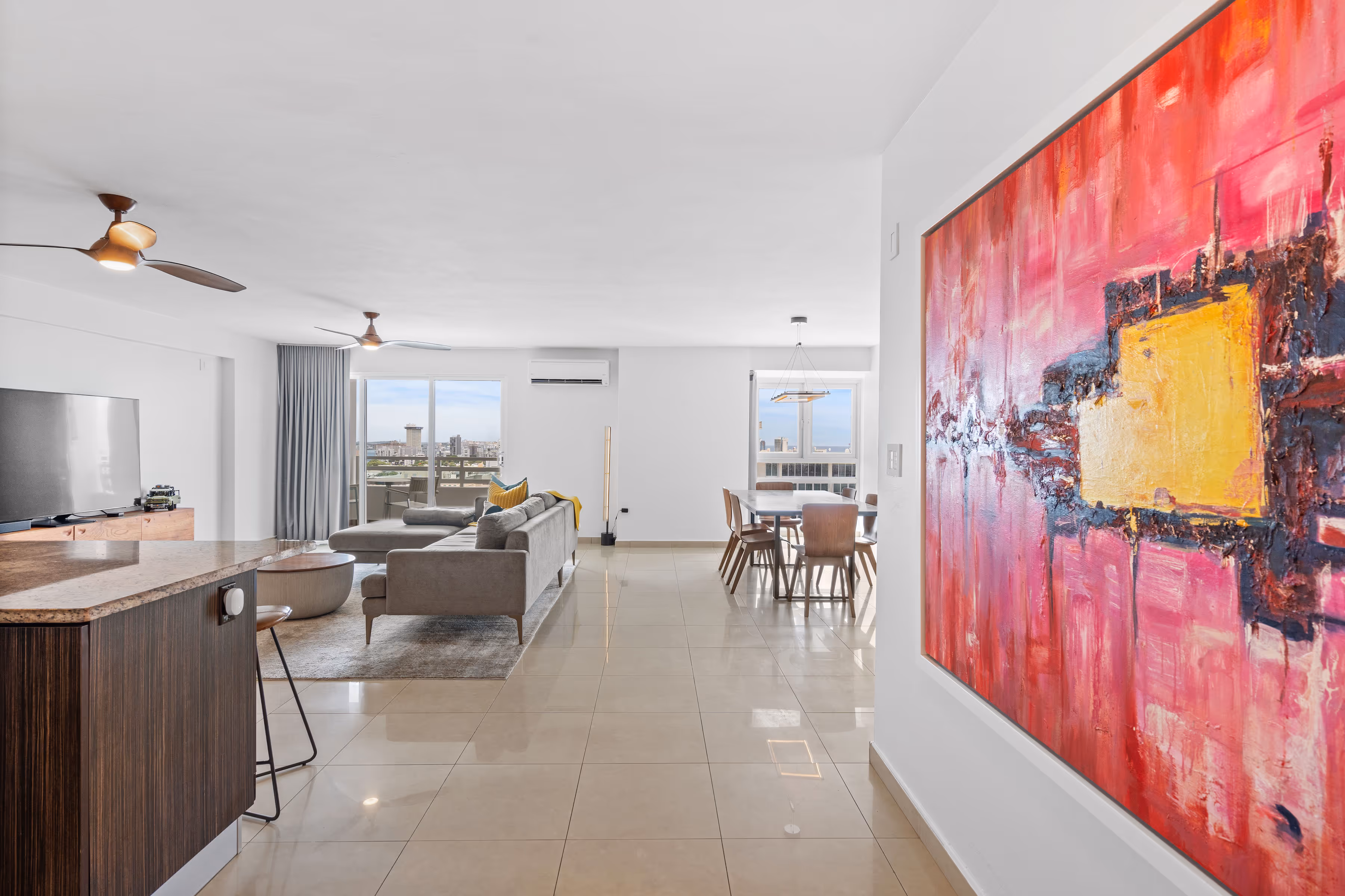 Modern condo living room with West Elm furniture at Metro Plaza Towers, Santurce