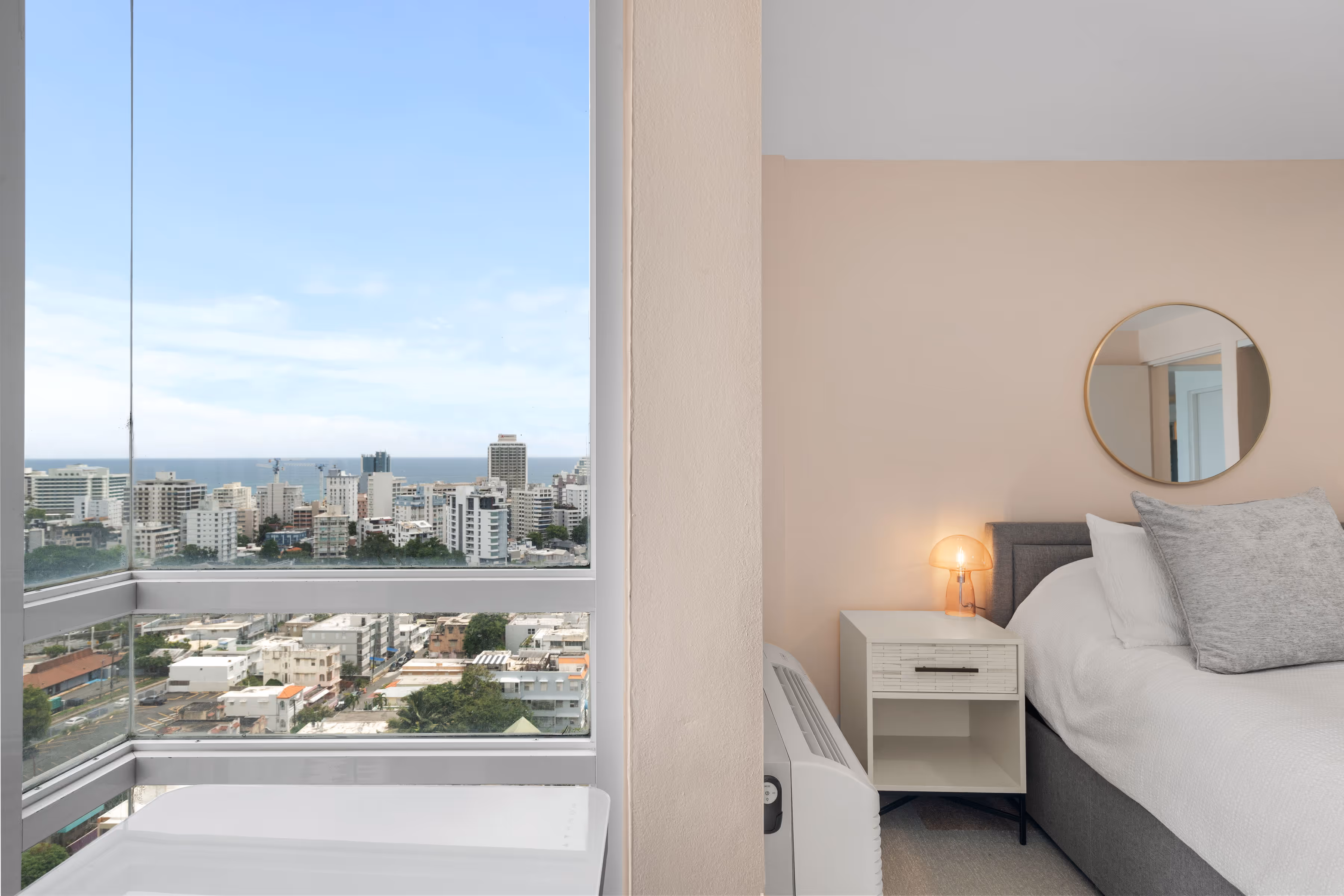 Condo balcony with seating area and panoramic views of Condado Lagoon