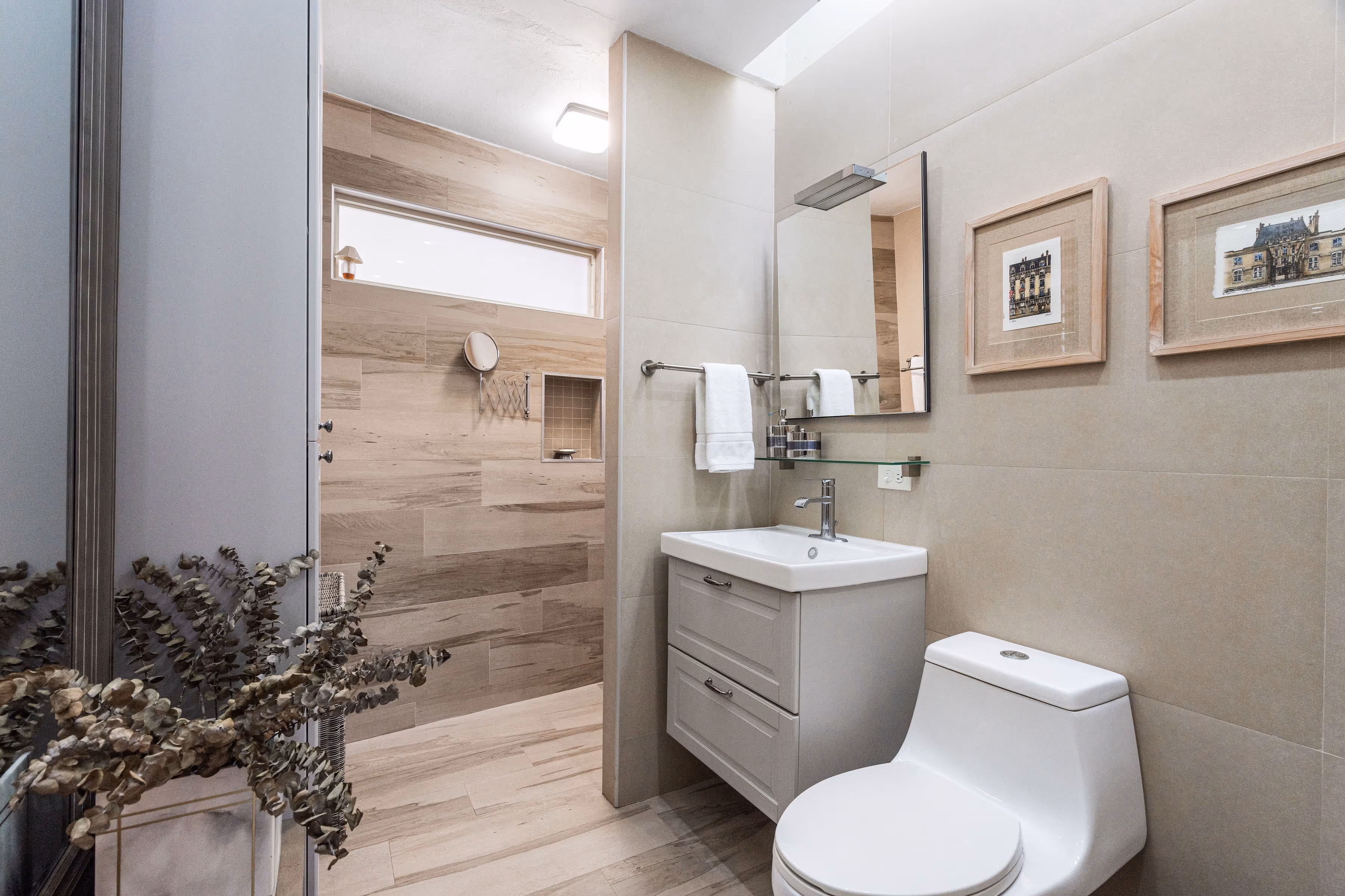 Energy-efficient home with AC units, roof treatment, and water heater