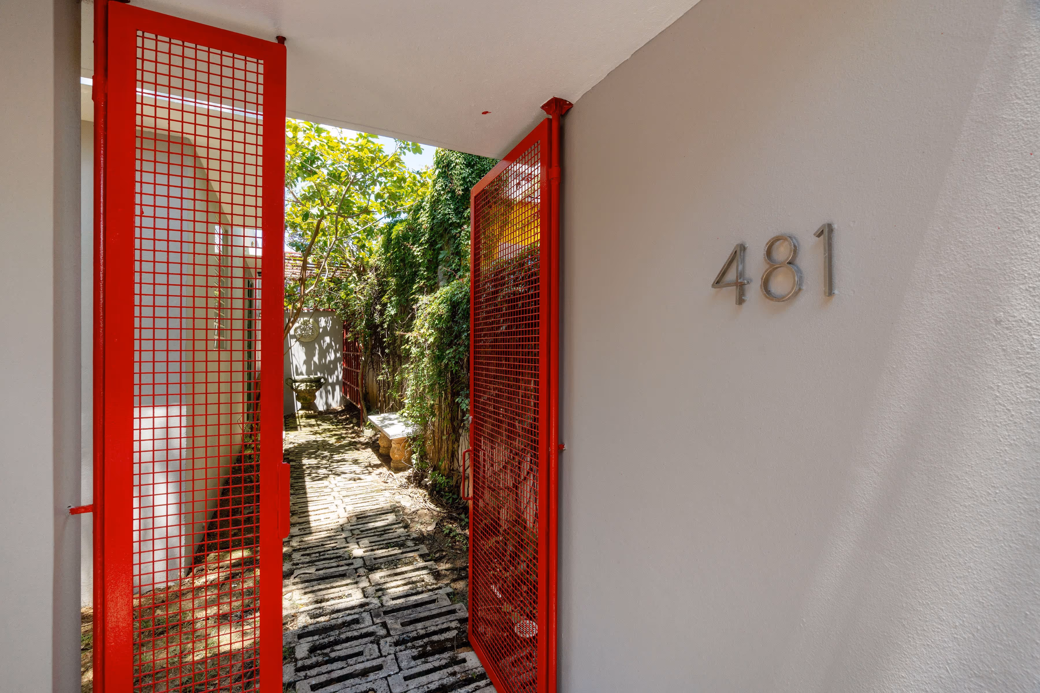 Front view of urban retreat steps from La Merced Park in San Juan