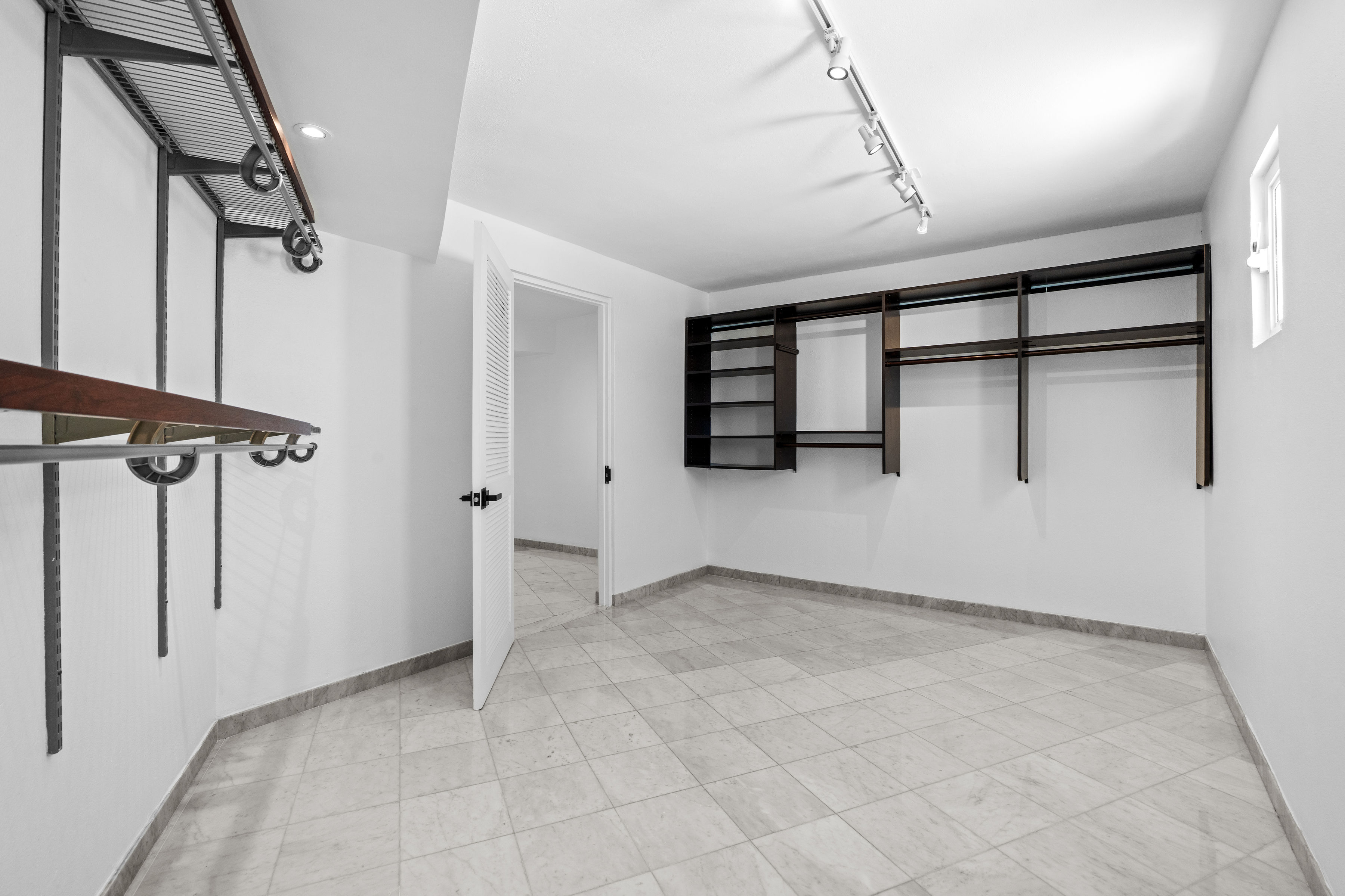 Millennium San Juan luxury condo tower exterior with concierge and valet services