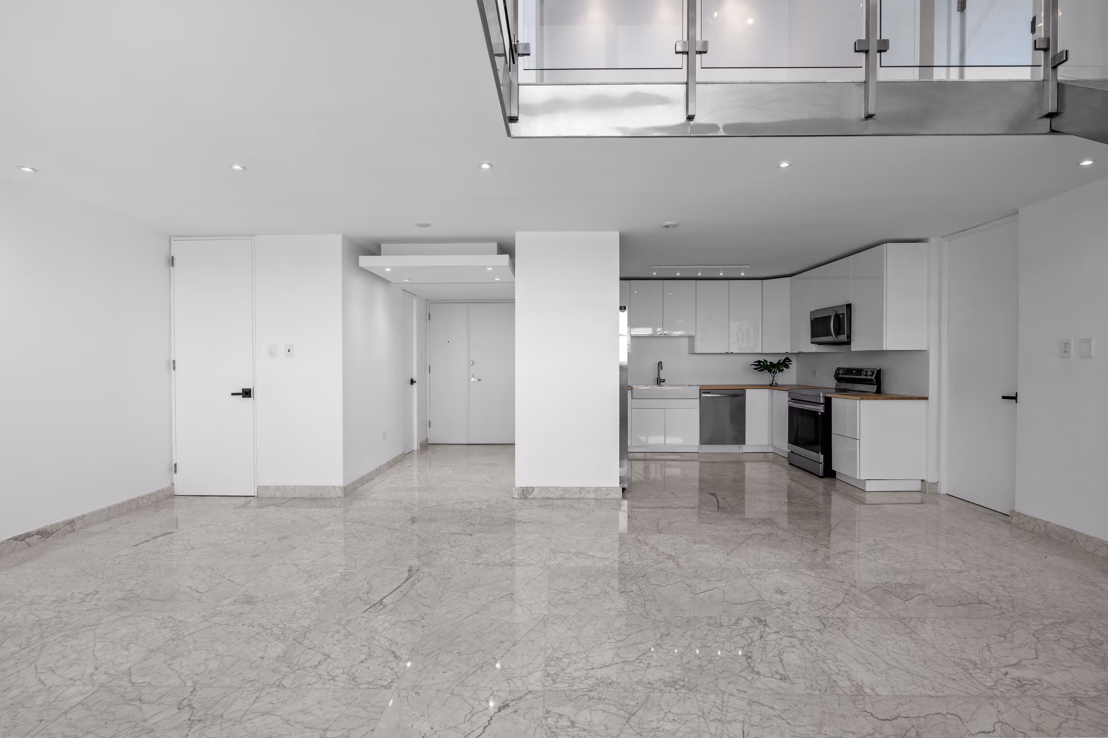 Floor-to-ceiling windows showcasing 270-degree ocean and lagoon views in San Juan