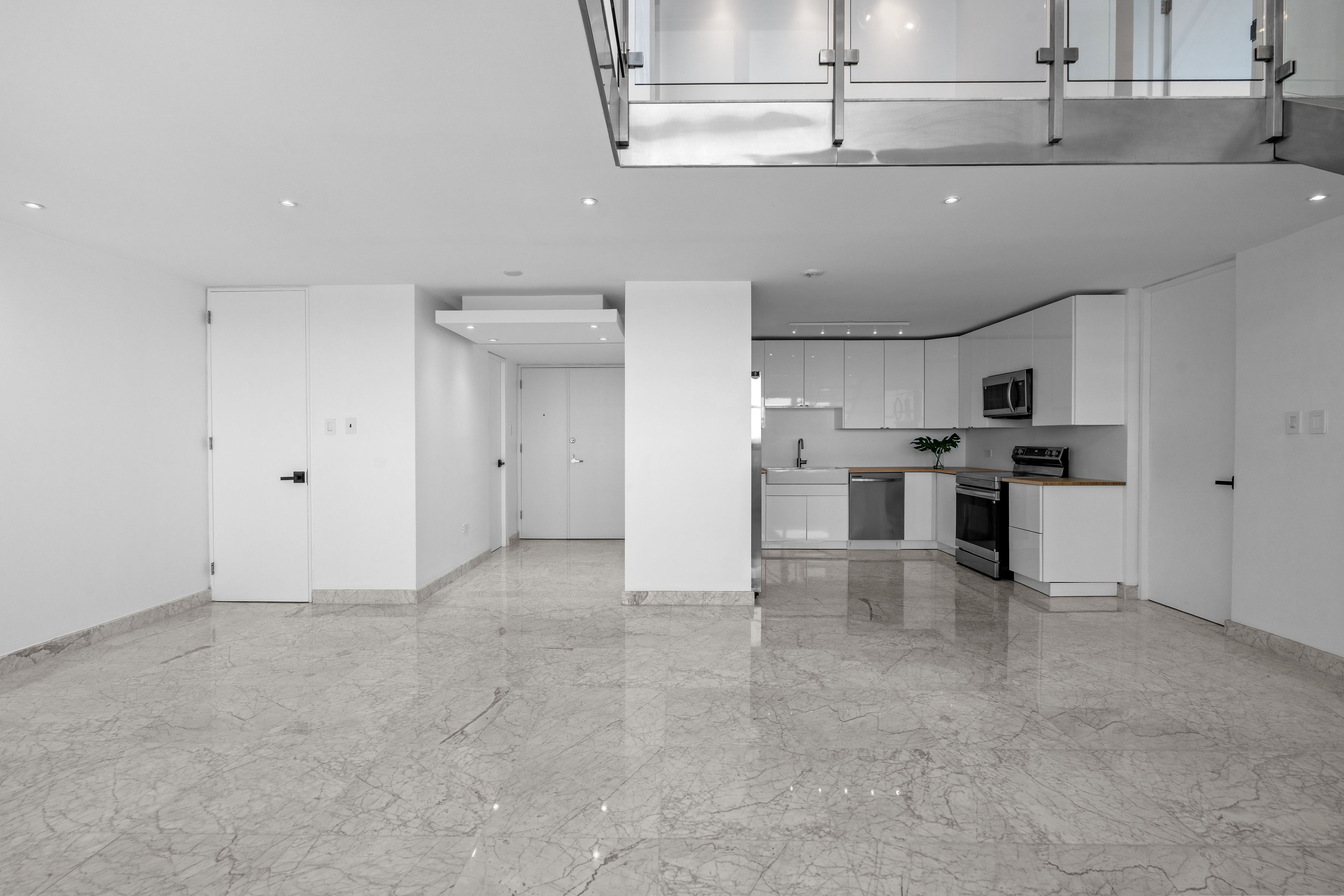 Floor-to-ceiling windows showcasing 270-degree ocean and lagoon views in San Juan