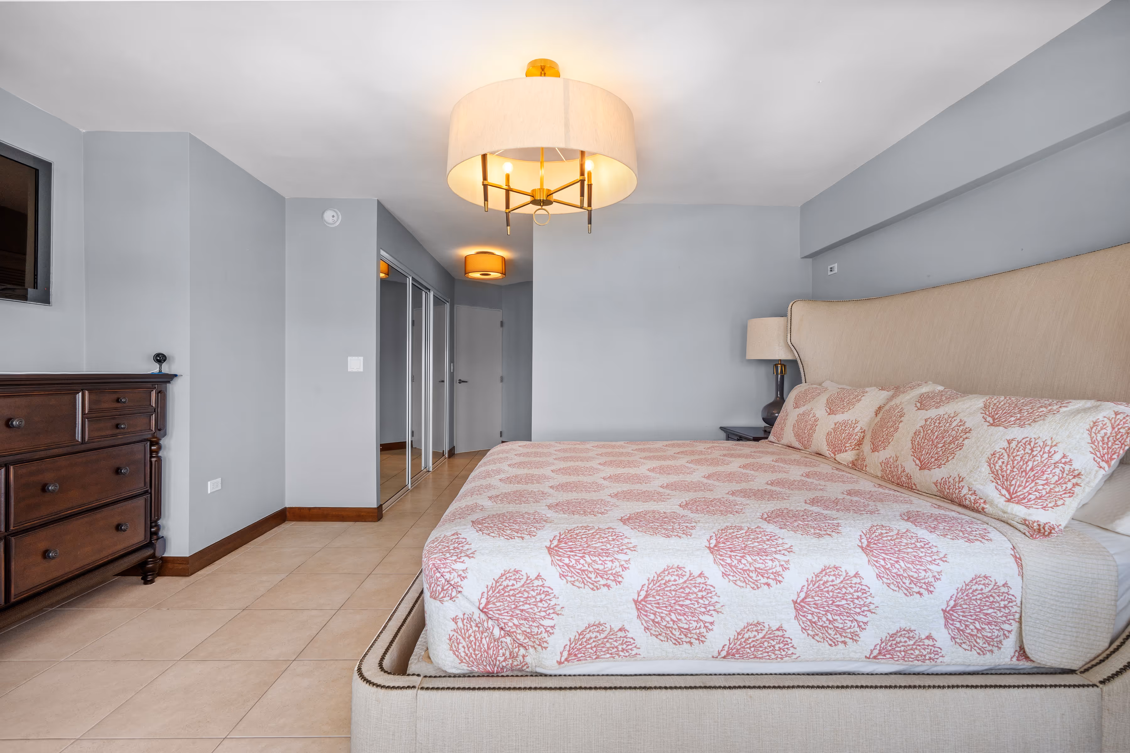 Guest bedroom with en-suite bath in modern San Juan apartment
