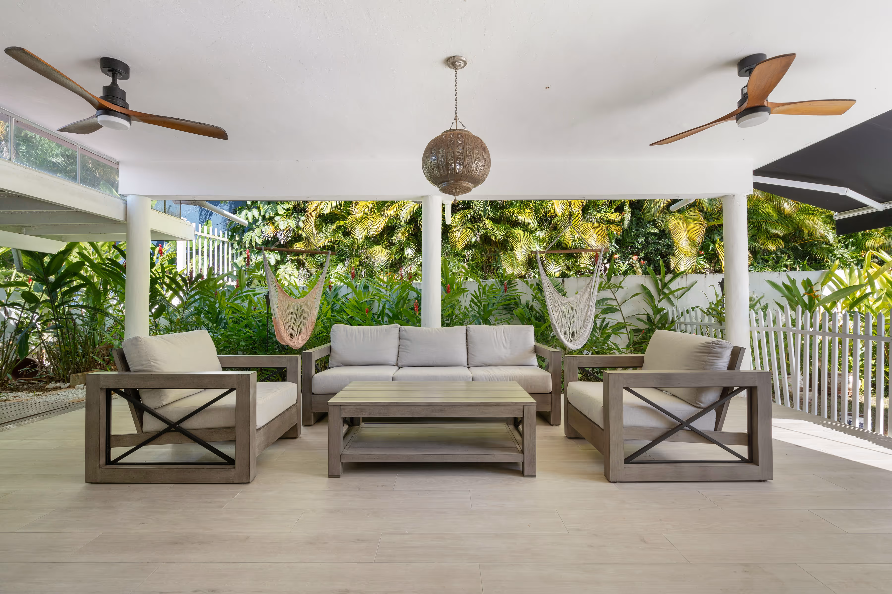 Gas range kitchen setup with Broan vented hood and sleek countertops