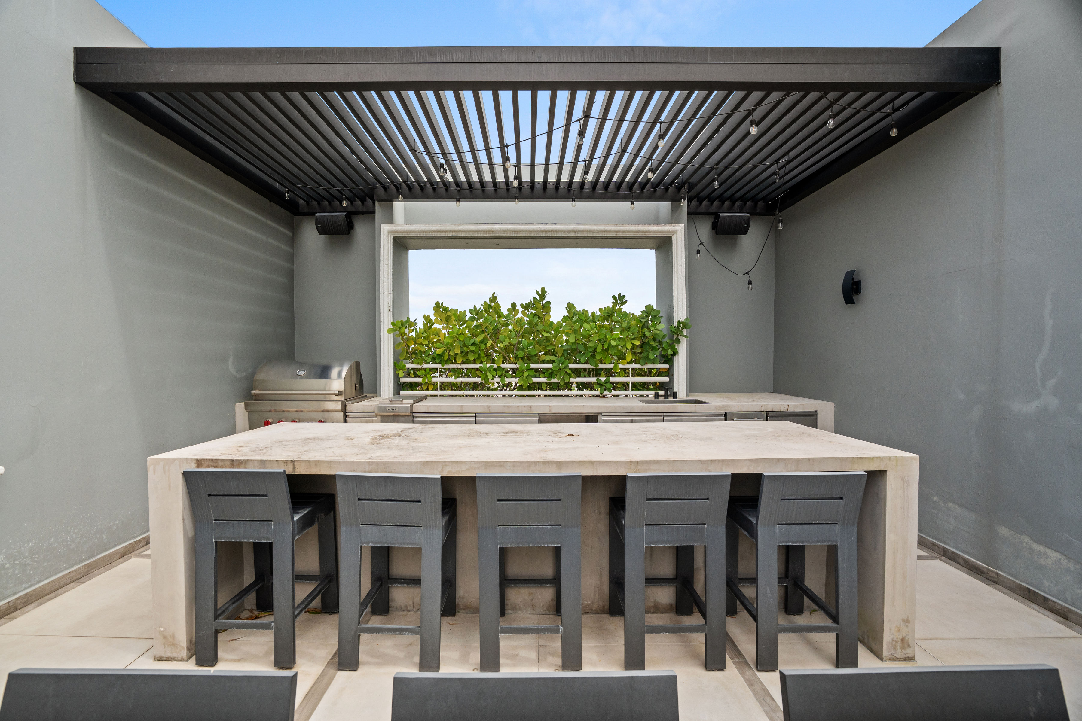 Comfortable family lounge area connecting bedrooms in two story penthouse